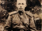 Он выжил при расстреле в Змиевке в августе 1942...