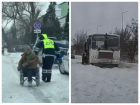 В непогоду инспекторы ДПС помогли женщине на инвалидной коляске и вытолкали автобус в Ростовской области