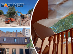 В Ростове при сносе аварийного здания на Серафимовича, 103 рабочие разрушили крышу соседнего жилого дома